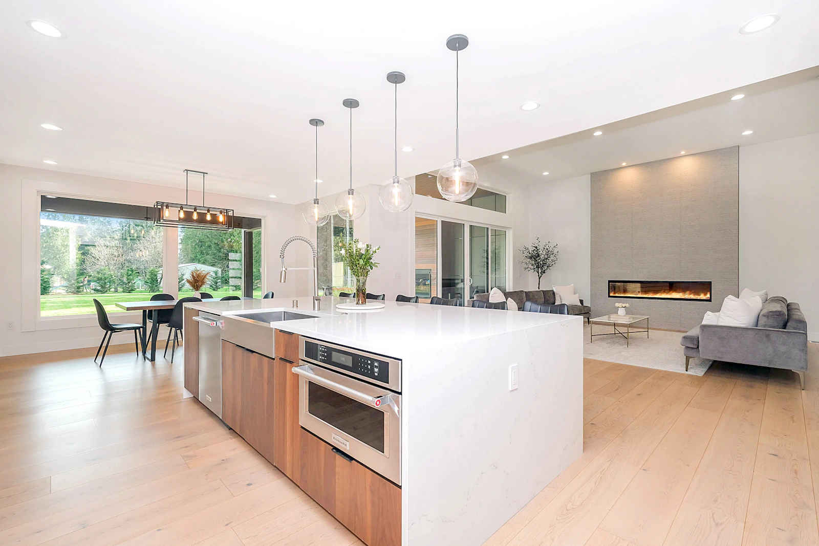 Open-plan kitchen and living area with timber flooring